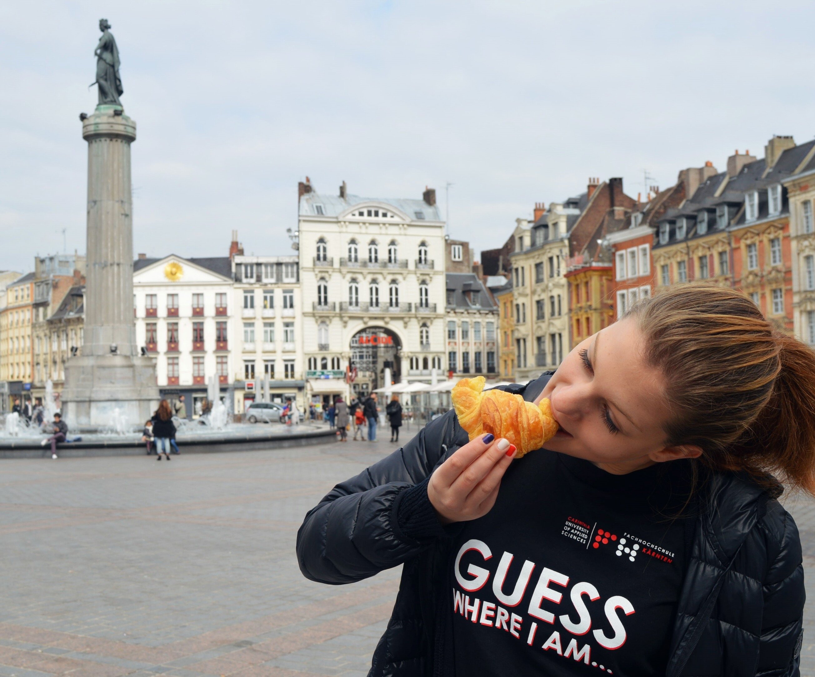 A student spending a semester abroad eats pastries